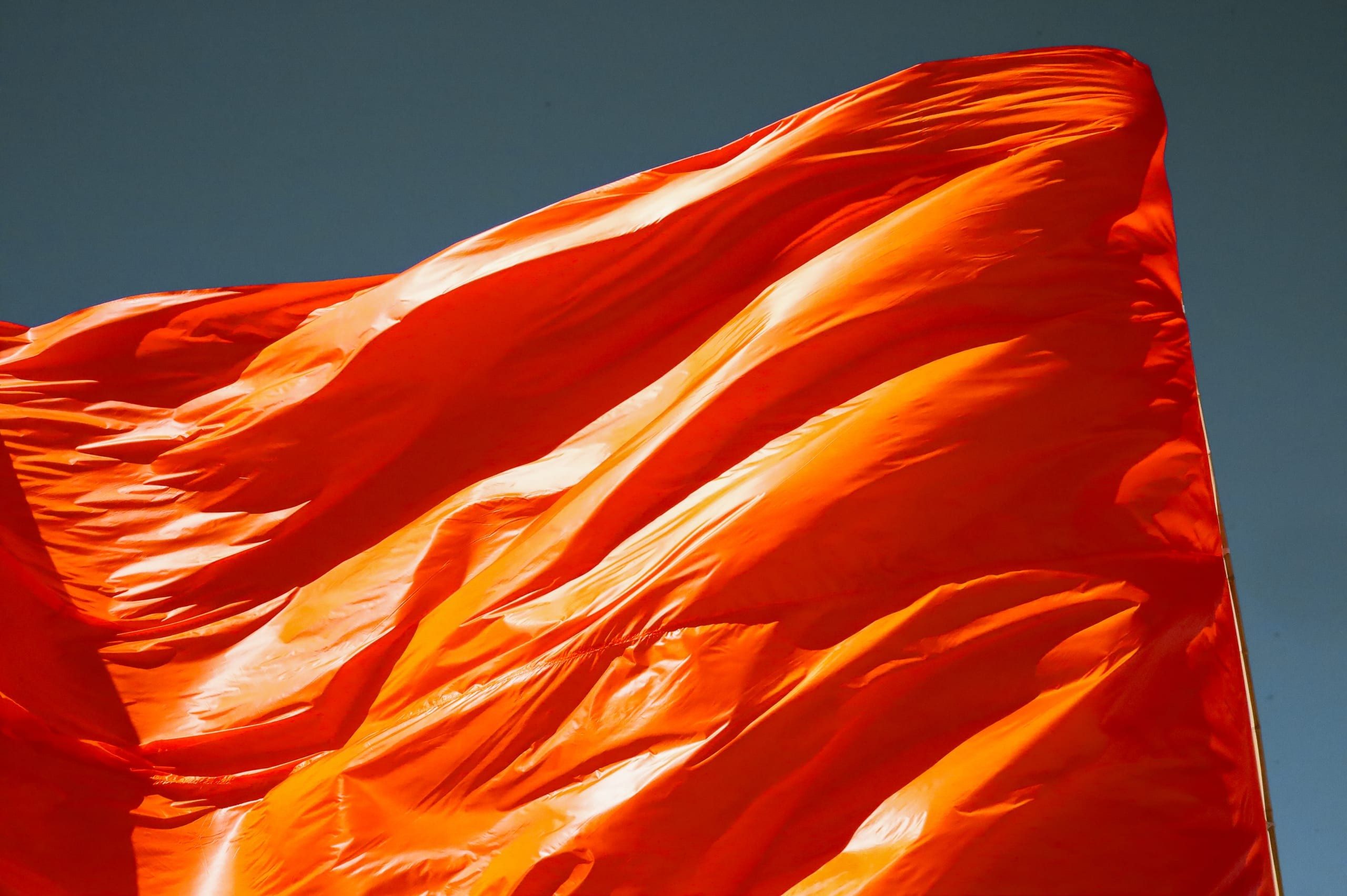Afrika Burn: Late afternoon on the Tankwa plain, when the sun beams sideways and the unforgiving wind makes larger than life flags possible to fly.